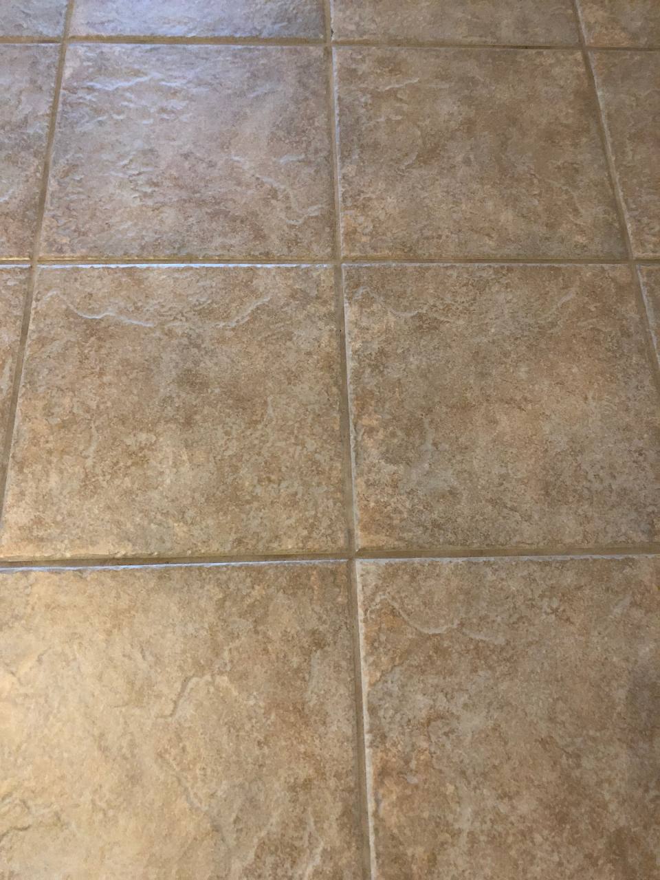 Same tile floor after professional tile and grout cleaning — grout lines restored — Scott's Carpet Care, Humble TX
