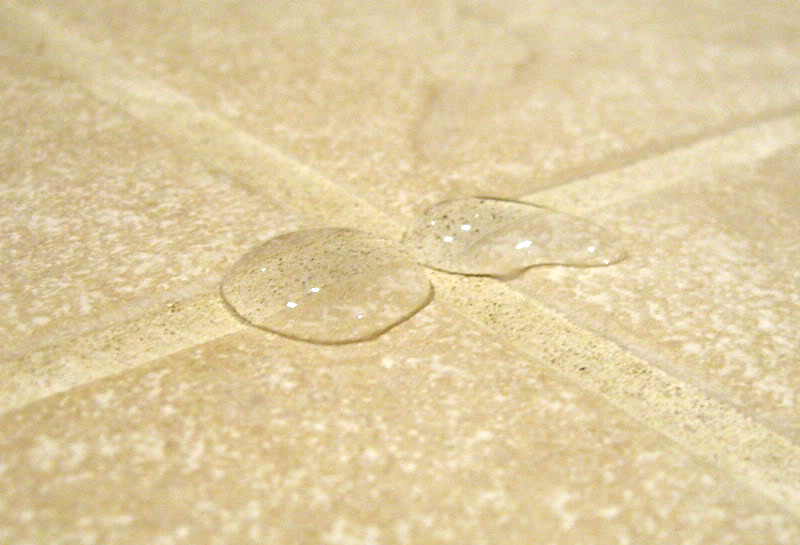 Applying penetrating grout sealer after a professional tile cleaning — Scott's Carpet Care, Humble TX